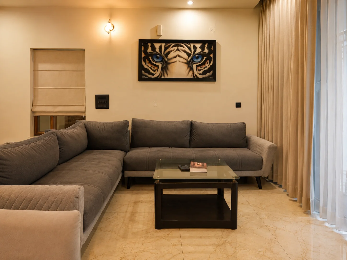 Chic velvet sofas and elegant seating layout at the best rated homestay in Dehradun